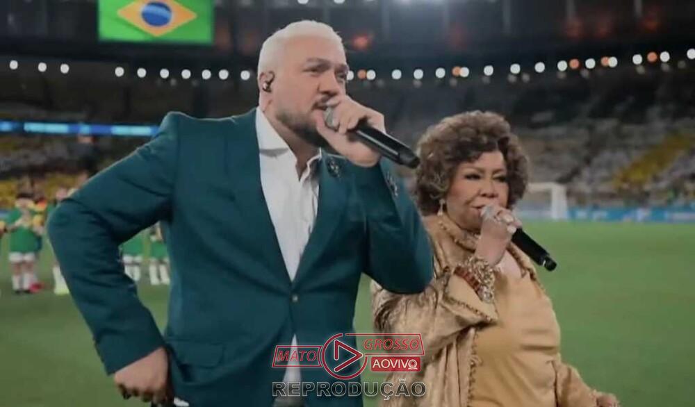 Belo e Alcione enfrentam críticas após interpretação do Hino Nacional em jogo da Seleção